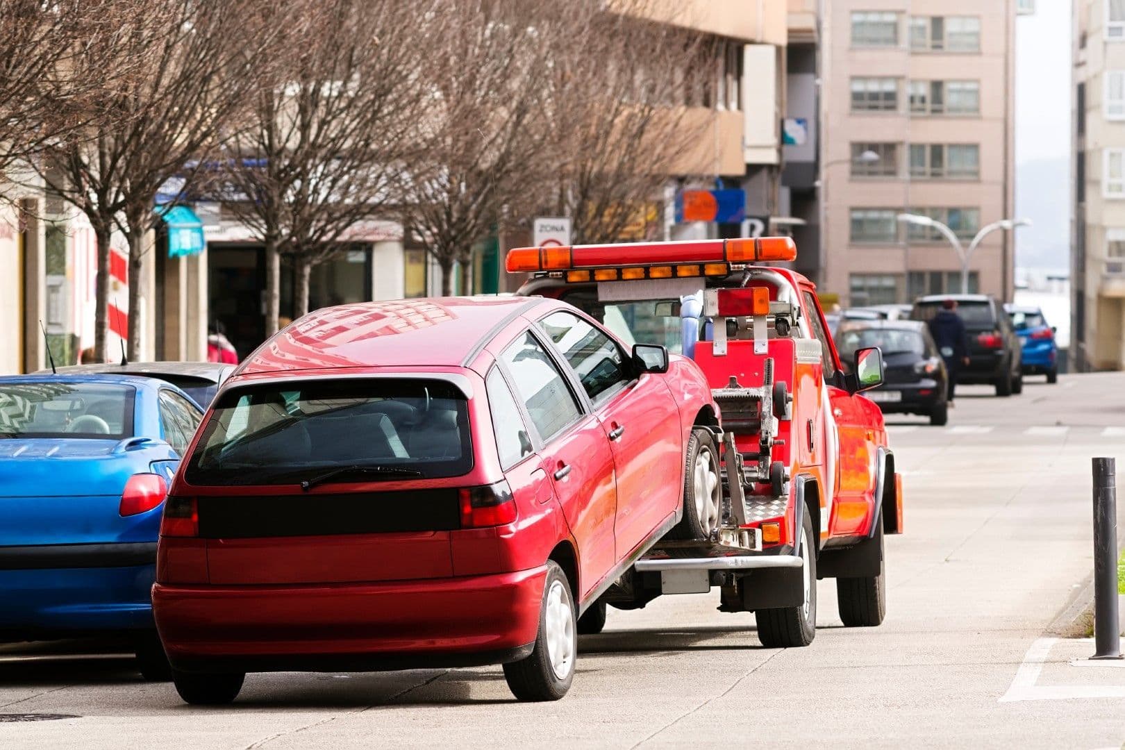 Riverside towing company flatbed tow truck ready for collision towing and vehicle recovery services